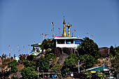 Myanmar - Kyaikhtiyo, several other stupas and shrines scattered on the ridge at the top of mount. 